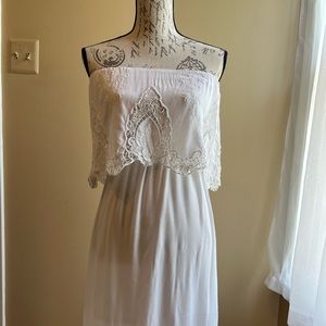 White cotton strapless midi length dress great for a outdoor party.